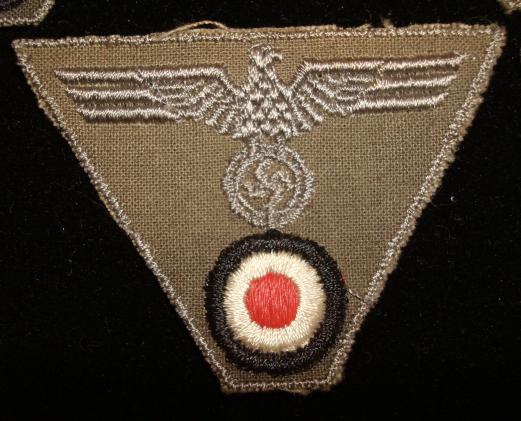 WWII GERMAN EM/NCO\'S M44 TRAPEZOID CAP INSIGNIA