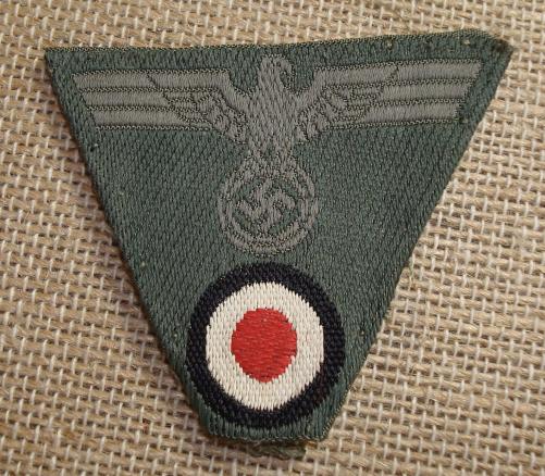 WWII GERMAN EM/NCO'S M43 TRAPEZOID CAP INSIGNIA