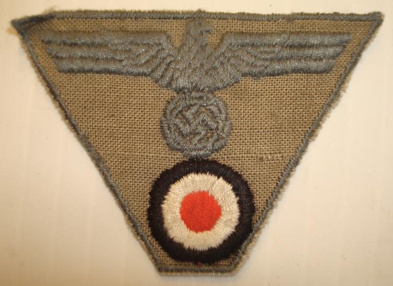 WWII GERMAN EM/NCO'S M44 TRAPEZOID CAP INSIGNIA